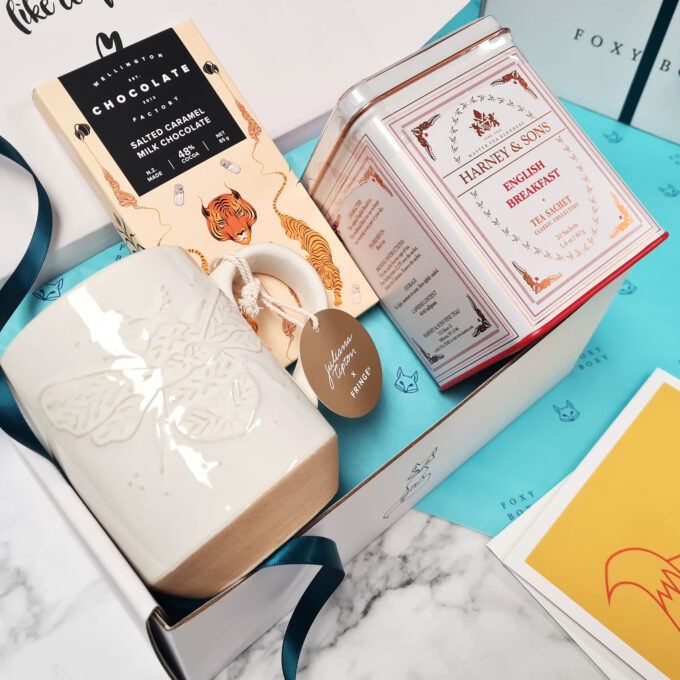 Tea Appreciation gift box by FOXY BOXY. Featuring Bumble Bee Mug from Fringe Studio, Harney & Sons English Breakfast Tea, and finally Salted Caramel Milk Chocolate from Wellington Chocolate Factory