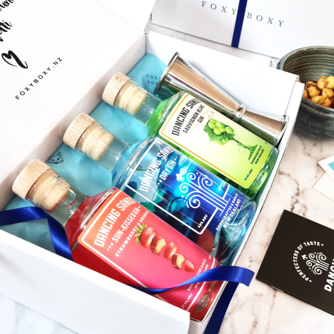 Let The Evening Be Gin hamper features Sauvignon Blanc Gin, Strawberry & Rhubarb Gin, Dry Gin