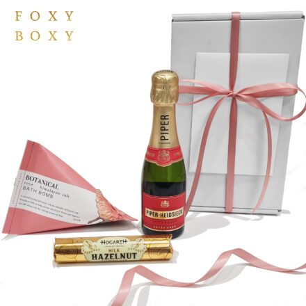 Olivia gift box by FOXY BOXY. Piper-Heidseick French champagne, NZ award-winning hazelnut milk chocolate from Hogarth Chocolate Makers and Rose & Himalayan Salt bath bomb from Botanical