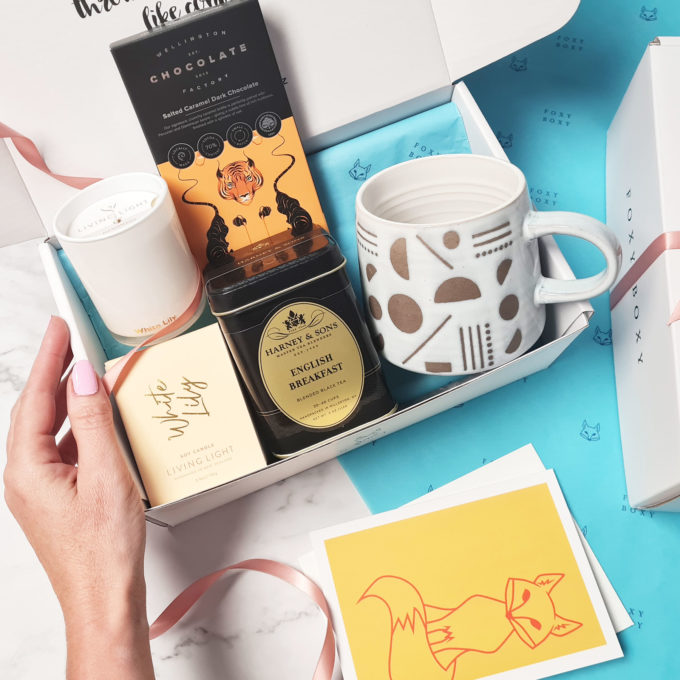 Lovely To A Tea gift box, FOXY BOXY New Zealand. Features scented candle, craft chocolate, english breakfast tea (loose leaf) and ceramic mug