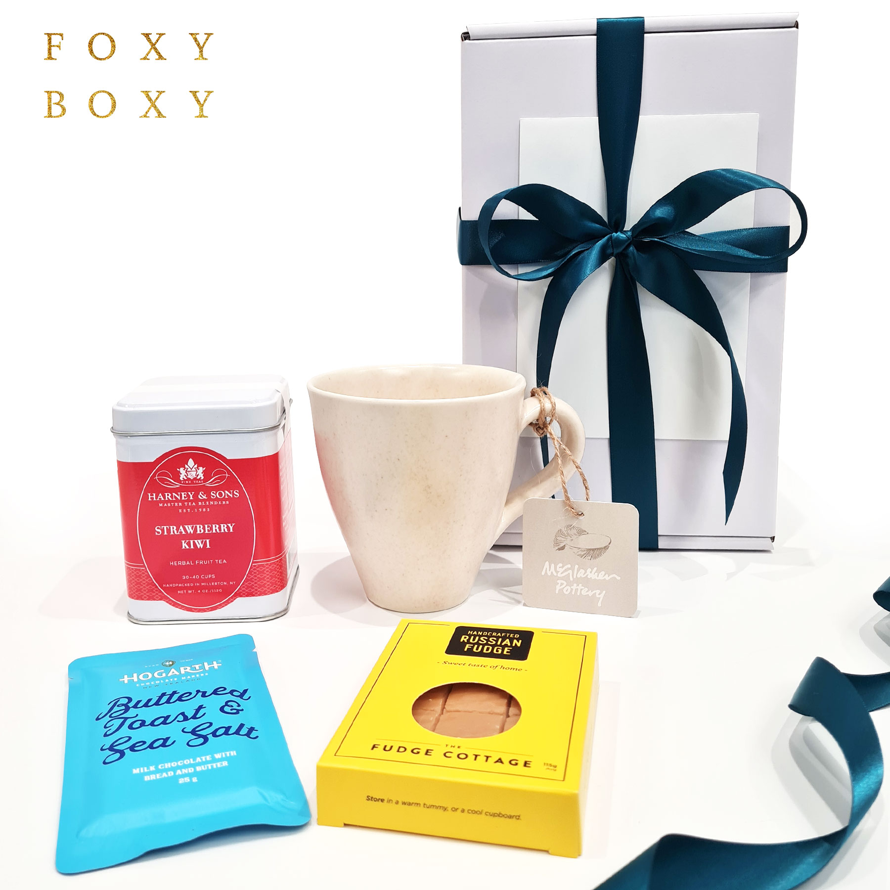FOXY-BOXY-lovely-to-a-tea-gift-box-strawberry-kiwi-fruit-tea-nz-pottery-mug-NZ Lovely to a Tea gift box with NZ McGlashen pottery mug, Harney & Sons strawberry & kiwi fruit tea, NZ fudge and craft chocolate. FOXY BOXY gift boxes