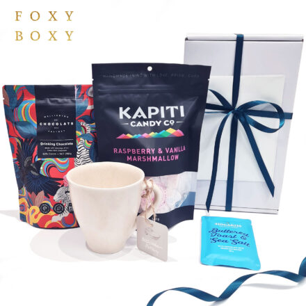 Hot Choc Love gift box by FOXY BOXY. Features a NZ-made mug from McGlashen Pottery, Wellington Chocolate Factory Drinking Chocolate, Kapiti Candy Co Raspberry & Vanilla Marshmallows and Hogarth Chocolate Makers Buttered Toast & Sea Salt Milk Chocolate