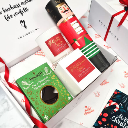 Christmas Spirit Gift Box By FOXY BOXY. Featuring A Pohutukawa Spiced Soy Candle, Long Matched In A Stunning Nutcracker Container And A Dark Chocolate Christmas Tree From Hogarth Chocolate Makers.