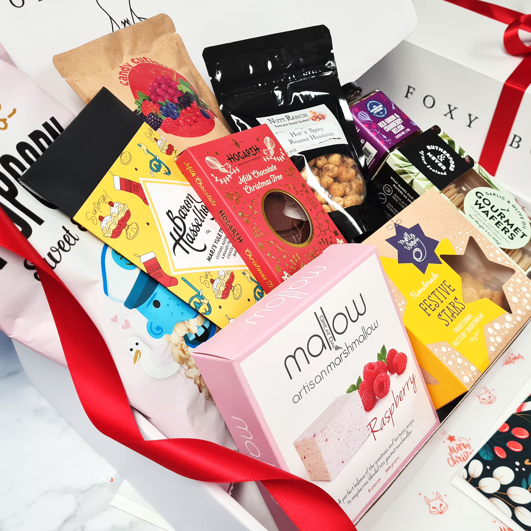 Family-Christmas-Hamper-FOXY-BOXY-popular-Xmas-gift-box Our best-selling Family Christmas Hamper is packed to the brim with sweet and savoury treats. All New Zealand made.