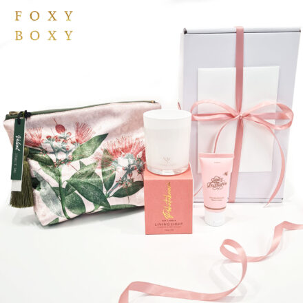 Floral Pamper Gift Box By FOXY BOXY. Features A Scented Candle, Hand Cream And A Velvet Make Bag With A Pohutukawa Print