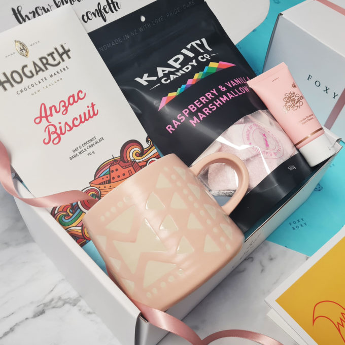 Pretty In Pink gift box. Pink-themed hamper. Ceramic mug, fresh marshmallows, award-winning chocolate and hand cream.