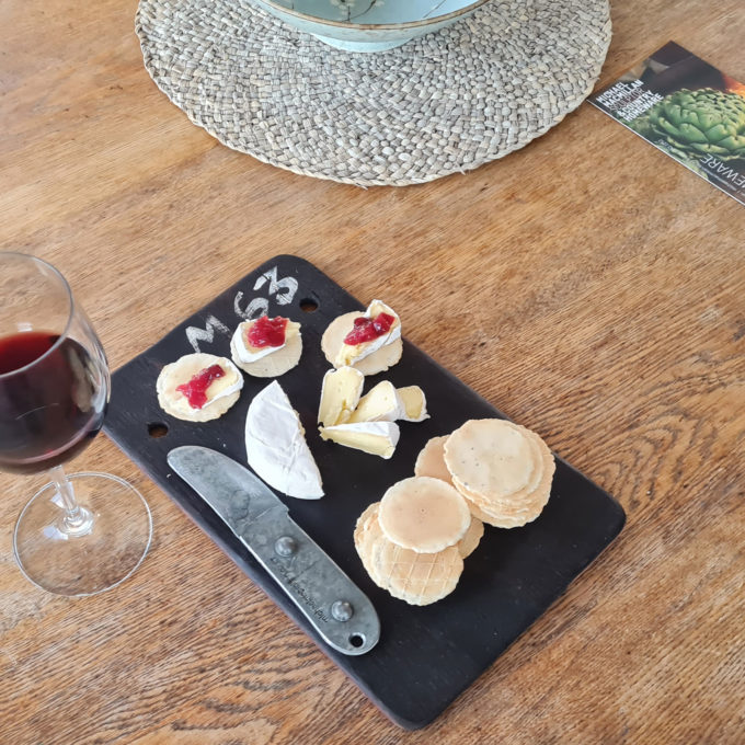 Cheeseboard with camembert cheese and crackers