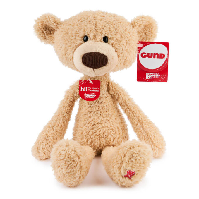 Toothpick and has a red stitch heart on his left paw