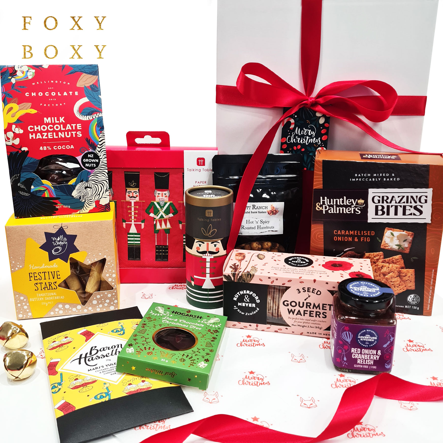 Merry-Gatherings-FOXY-BOXY-gift-boxes-Christmas-hamper Merry Gatherings Christmas gift box by FOXY BOXY. A delicious mix of sweet and savoury treats, Christmas nutcracker napkins and a festive fun game of dip sticks (charade, joke, dare or hum that tune) game that will get everyone talking at the table.