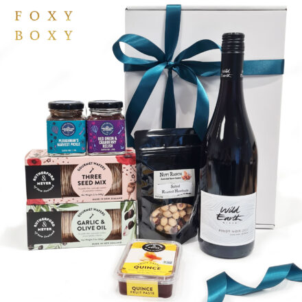Central Otago Pinot & Nibbles Gift Box By FOXY BOXY. Wild Earth Pinot Noir 2022, Nutt Ranch Salted Roated Hazelnuts, 2 Varieties Of Rutherford & Meyer Gourmet Wafers, Rutherford & Meyer Quince Paste, The Adventure Kitchen Ploughman's Harvest Pickle And Red Onion & Cranberry Relish
